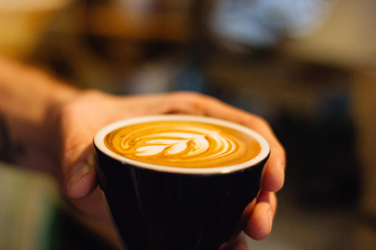 A flat white at Goodness Gracious, 2014